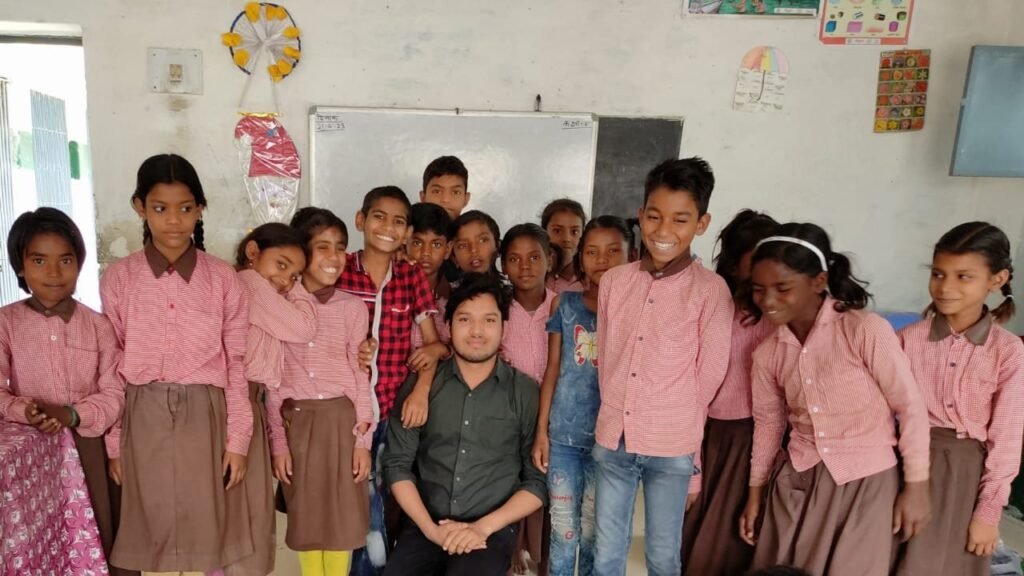 Shubham Kumar 1 Shubham Kumar with the Students of Primary School Ukathi 210423